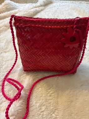 Handwoven Red Crossbody Bag with Flower Charm